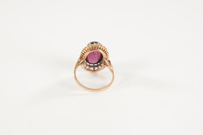 Lot 446 - A 14CT GOLD RING WITH LARGE CABOCHON AMETHYST