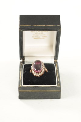 Lot 446 - A 14CT GOLD RING WITH LARGE CABOCHON AMETHYST