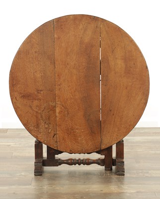 Lot 1228 - A 19TH CENTURY OAK TILT TOP TAVERN TABLE