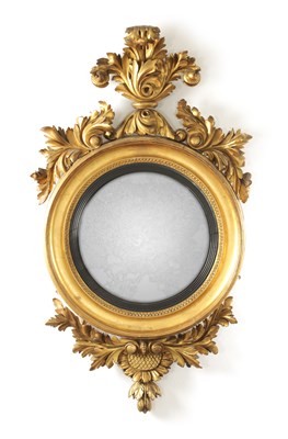 Lot 1264 - A GOOD REGENCY CARVED GILTWOOD CONVEX HANGING MIRROR