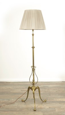 Lot 1240 - AN ART NOUVEAU BRASS TRIPOD BASE TELESCOPIC STANDARD LAMP