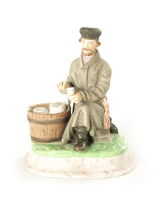 Lot 89 - AN IMPERIAL RUSSIAN SEATED JEWISH FIGURE