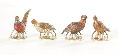 Lot 244 - A CASED SET OF FOUR COLD-PAINTED BRONZE AND SILVER METAL GAME BIRD MENU HOLDERS