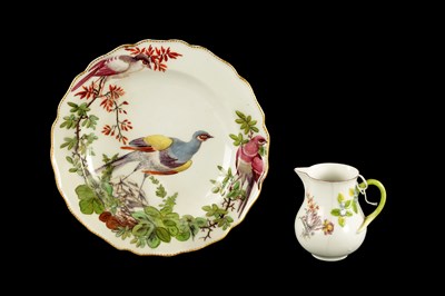 Lot 400 - A RARE CHELSEA PORCELAIN SPARROW BEAK CREAM JUG CIRCA 1755, together with A CHELSEA PORCELAIN PLATE PAINTED WITH EXOTIC BIRDS CIRCA 1760