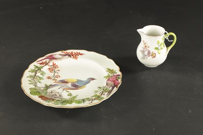Lot 400 - A RARE CHELSEA PORCELAIN SPARROW BEAK CREAM JUG CIRCA 1755, together with A CHELSEA PORCELAIN PLATE PAINTED WITH EXOTIC BIRDS CIRCA 1760