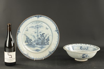 Lot 374 - A MID 18TH CENTURY LIVERPOOL DELFT CHARGER AND A BOWL