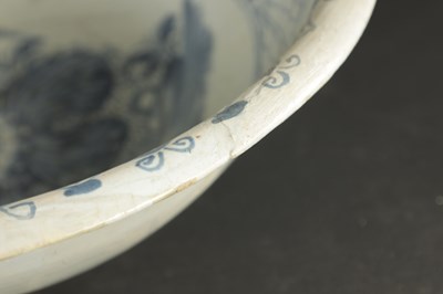 Lot 374 - A MID 18TH CENTURY LIVERPOOL DELFT CHARGER AND A BOWL