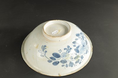 Lot 374 - A MID 18TH CENTURY LIVERPOOL DELFT CHARGER AND A BOWL