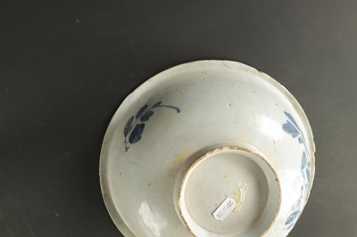 Lot 374 - A MID 18TH CENTURY LIVERPOOL DELFT CHARGER AND A BOWL