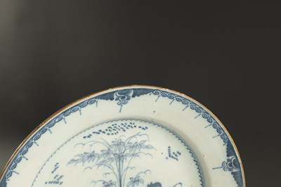 Lot 374 - A MID 18TH CENTURY LIVERPOOL DELFT CHARGER AND A BOWL