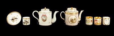 Lot 52 - TWO 18TH CENTURY PARIS PORCELAIN CYLINDRICAL TEAPOTS TOGETHER WITH A PARIS COFFEE CUP AND SAUCER PAINTED WITH BIRDS AND THREE OTHER COFFEE CANS