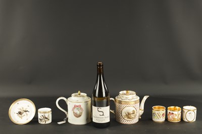Lot 52 - TWO 18TH CENTURY PARIS PORCELAIN CYLINDRICAL TEAPOTS TOGETHER WITH A PARIS COFFEE CUP AND SAUCER PAINTED WITH BIRDS AND THREE OTHER COFFEE CANS