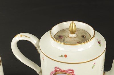 Lot 52 - TWO 18TH CENTURY PARIS PORCELAIN CYLINDRICAL TEAPOTS TOGETHER WITH A PARIS COFFEE CUP AND SAUCER PAINTED WITH BIRDS AND THREE OTHER COFFEE CANS