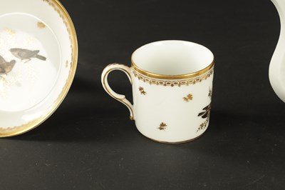 Lot 52 - TWO 18TH CENTURY PARIS PORCELAIN CYLINDRICAL TEAPOTS TOGETHER WITH A PARIS COFFEE CUP AND SAUCER PAINTED WITH BIRDS AND THREE OTHER COFFEE CANS
