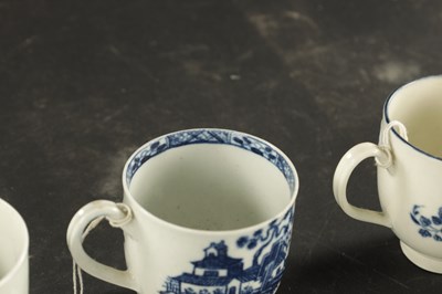 Lot 343 - A COLLECTION OF FOUR WORCESTER COFFEE CUPS PRINTED BLUE AND WHITE CHINOISERIE SCENES, THE OTHER WITH FRUIT