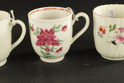 Lot 38 - A WORCESTER FLUTED COFFEE CUP AND SAUCER PAINTED WITH FLOWERS WITH TWO OTHERS, ONE WITH CHINESE FIGURES CIRCA 1770