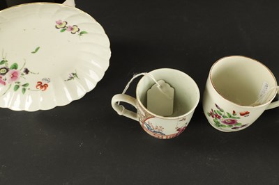 Lot 38 - A WORCESTER FLUTED COFFEE CUP AND SAUCER PAINTED WITH FLOWERS WITH TWO OTHERS, ONE WITH CHINESE FIGURES CIRCA 1770