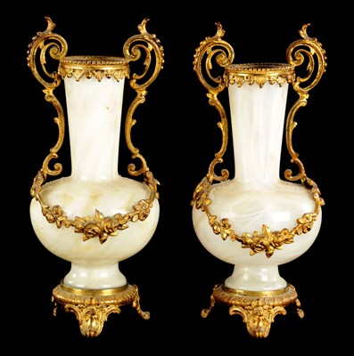 Lot 20 - A PAIR OF LATE 19TH CENTURY OPAQUE GLASS AND ORMOLU MOUNTED VASES