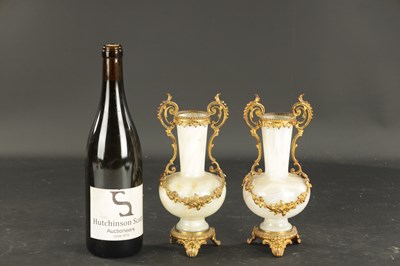 Lot 20 - A PAIR OF LATE 19TH CENTURY OPAQUE GLASS AND ORMOLU MOUNTED VASES