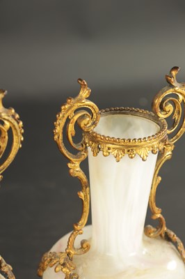 Lot 20 - A PAIR OF LATE 19TH CENTURY OPAQUE GLASS AND ORMOLU MOUNTED VASES