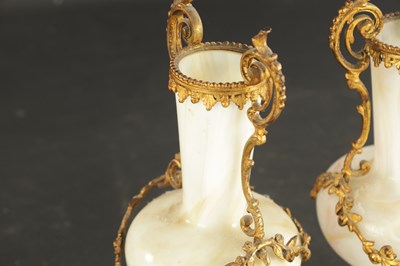 Lot 20 - A PAIR OF LATE 19TH CENTURY OPAQUE GLASS AND ORMOLU MOUNTED VASES