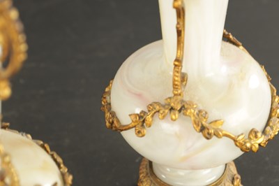 Lot 20 - A PAIR OF LATE 19TH CENTURY OPAQUE GLASS AND ORMOLU MOUNTED VASES