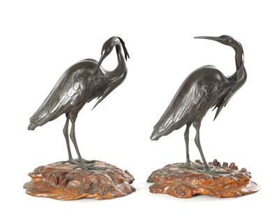 Lot 197 - A GOOD PAIR OF JAPANESE MEIJI BRONZE AND CARVED WOOD SCULPTURES OF CRANES