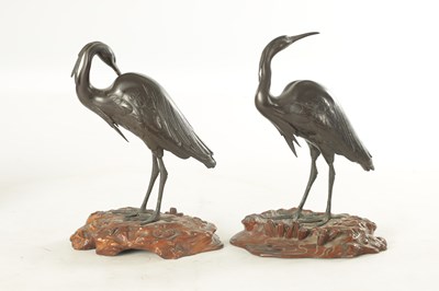 Lot 197 - A GOOD PAIR OF JAPANESE MEIJI BRONZE AND CARVED WOOD SCULPTURES OF CRANES