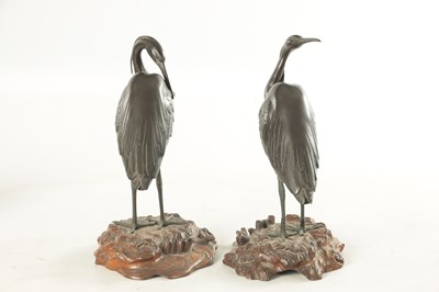 Lot 197 - A GOOD PAIR OF JAPANESE MEIJI BRONZE AND CARVED WOOD SCULPTURES OF CRANES