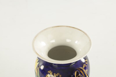 Lot 149 - A SPODE PORCELAIN VASE PAINTED WITH FLOWERS ON A COBALT GROUND
