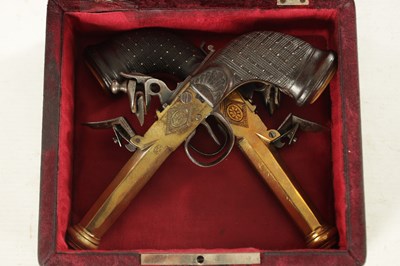 Lot 519 - BOUTET A VERSAILLES. A PAIR OF EARLY 19TH CENTURY FRENCH BRASS FLINTLOCK PISTOLS