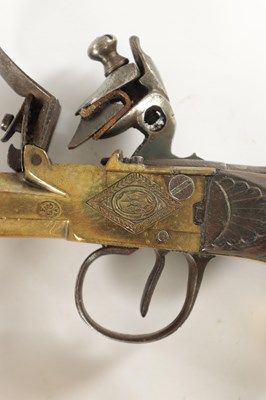 Lot 519 - BOUTET A VERSAILLES. A PAIR OF EARLY 19TH CENTURY FRENCH BRASS FLINTLOCK PISTOLS