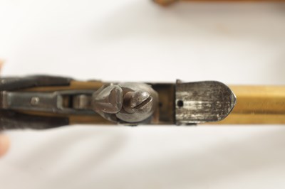 Lot 519 - BOUTET A VERSAILLES. A PAIR OF EARLY 19TH CENTURY FRENCH BRASS FLINTLOCK PISTOLS