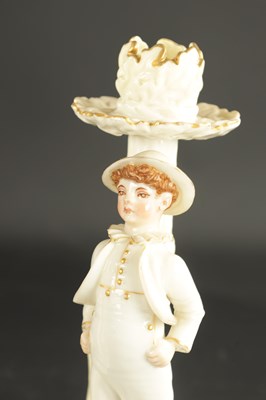Lot 248 - A PAIR OF ROYAL WORCESTER CANDLESTICKS