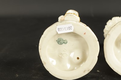 Lot 248 - A PAIR OF ROYAL WORCESTER CANDLESTICKS