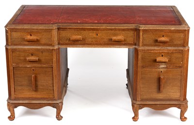 Lot 952 - A 1930’S GILLOWS STYLE OAK PEDESTAL DESK with...