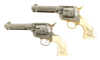 Lot 560 - A PAIR OF FRANKLIN MINT JOHN WAYNE WESTERN COMMEMORATIVE .45 SIX SHOT SINGLE ACTION REVOLVERS