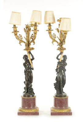 Lot 852 - A FINE PAIR OF REGENCY BRONZE, ORMOLU AND PORPHYRY CANDELABRA