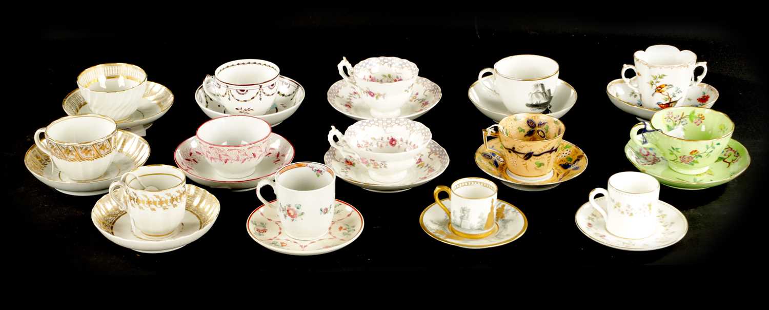 Lot 264 - A COLLECTION OF FOURTEEN 19TH CENTURY PORCELAIN TEA CUPS AND SAUCERS