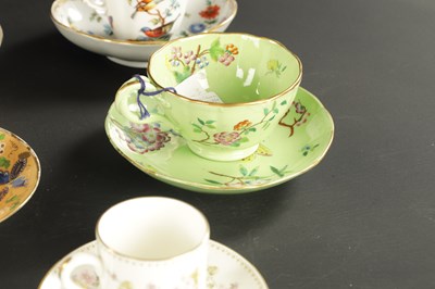 Lot 264 - A COLLECTION OF FOURTEEN 19TH CENTURY PORCELAIN TEA CUPS AND SAUCERS