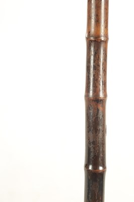 Lot 473 - A LATE 19TH CENTURY BAMBOO 'FLICK STICK' WALKING CANE