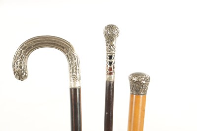 Lot 470 - A COLLECTION OF THREE EARLY 20TH CENTURY SILVER MOUNTED WALKING STICKS