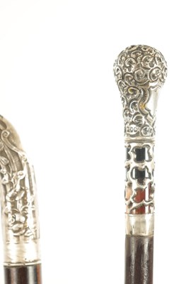 Lot 470 - A COLLECTION OF THREE EARLY 20TH CENTURY SILVER MOUNTED WALKING STICKS