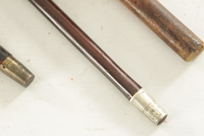 Lot 470 - A COLLECTION OF THREE EARLY 20TH CENTURY SILVER MOUNTED WALKING STICKS