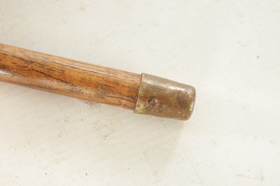 Lot 450 - A LATE 19TH CENTURY WALNUT WALKING CANE