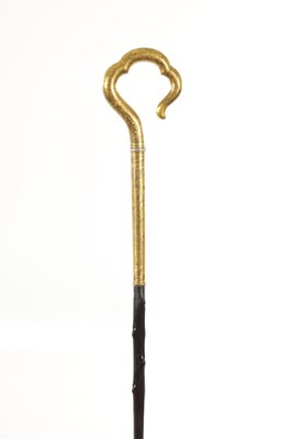 Lot 471 - A LATE 19TH CENTURY ORIENTAL GILT MIXED METAL WALKING STICK