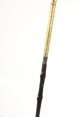 Lot 471 - A LATE 19TH CENTURY ORIENTAL GILT MIXED METAL WALKING STICK