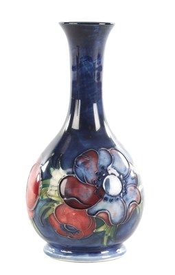 Lot 44 - A WALTER MOORCROFT ANEMONE PATTERN BULBOUS VASE