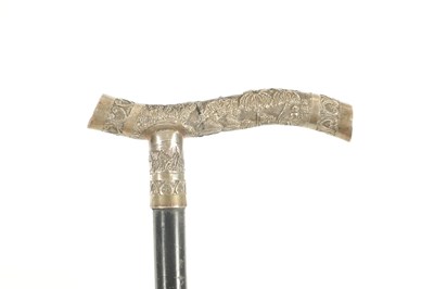 Lot 435 - A LATE 19TH CENTURY CONTINENTAL GILT METAL MOUNTED EBONISED WALKING CANE