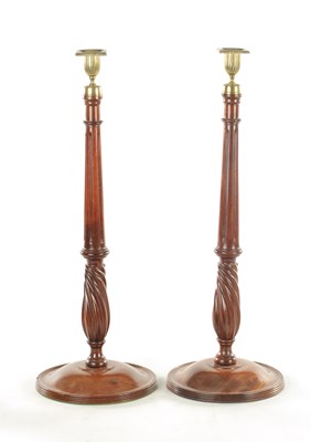 Lot 1198 - A LARGE PAIR OF GEORGE III STYLE TURNED MAHOGANY CANDLESTICKS